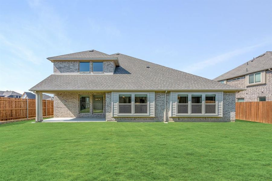 Front exterior of a new home in Parks at Panchasarp Farms 65, Burleson, TX, highlighting curb appeal (Image 25). Front exterior of a new home in Parks at Panchasarp Farms 65, Burleson, TX, highlighting curb appeal (Image 25).