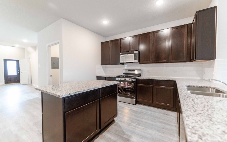 Furnished interior view inside a new home in Hickory Ridge, Elmendorf (Image 2). Furnished interior view inside a new home in Hickory Ridge, Elmendorf (Image 2).