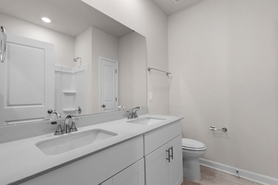 Furnished interior view inside a new home in Waterside - Coastline Series, Longs (Image 12).