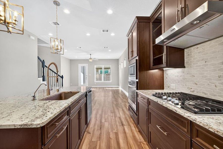 Furnished interior view inside a new home in Spring Brook Village - Luxe Series, Houston (Image 11).