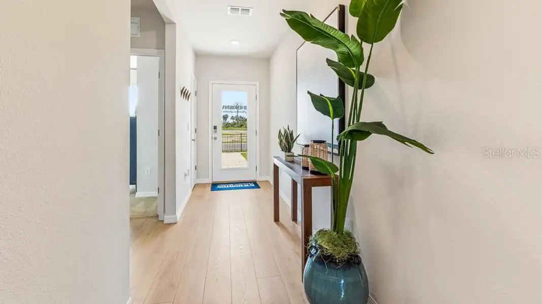 Furnished interior view inside a new home in Bella Lago, Parrish (Image 6).