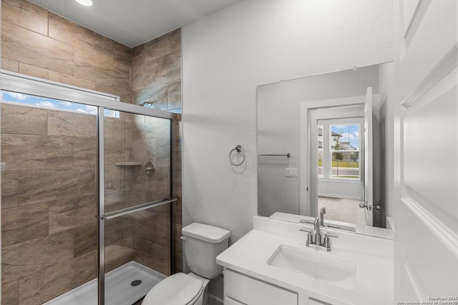 Furnished interior view inside a new home in August Fields, New Braunfels (Image 5).