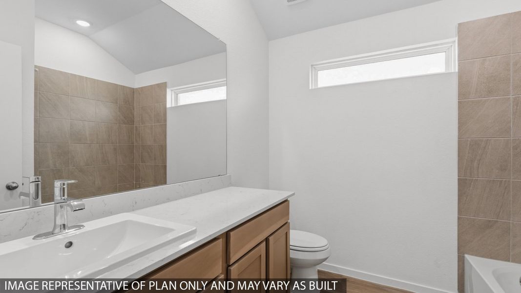 Furnished interior view inside a new home in Sunterra, Katy (Image 10).