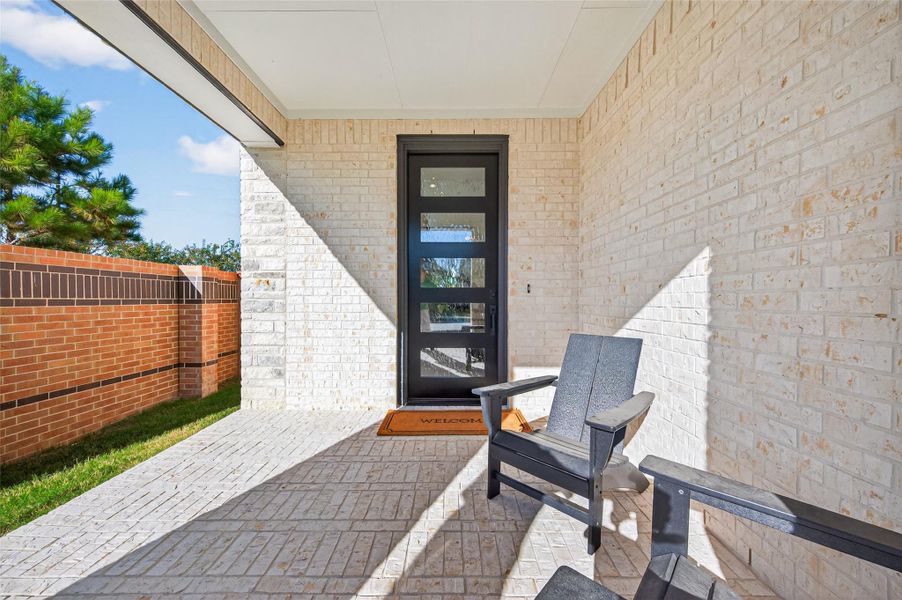 Exterior details and patio area of a home in Elyson - 40', Katy (Image 2). Exterior details and patio area of a home in Elyson - 40', Katy (Image 2).