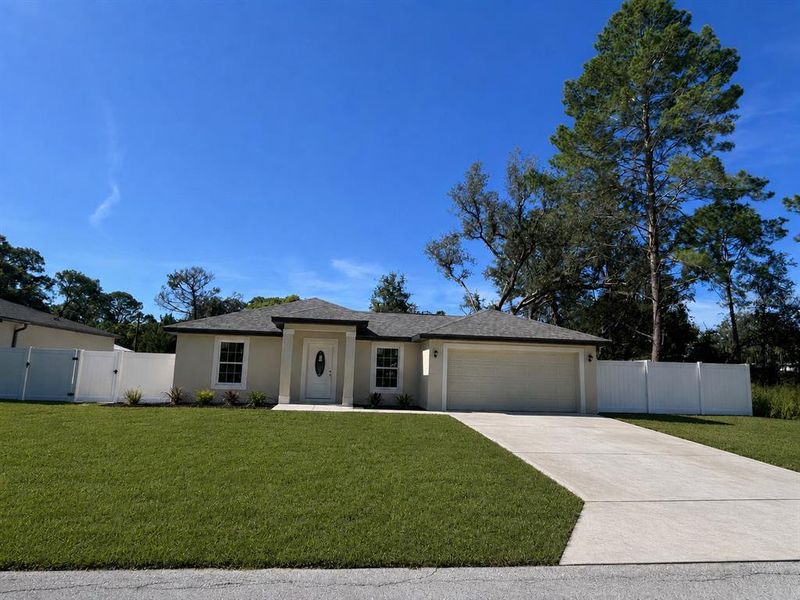 Front exterior of a new home in , Spring Hill, FL, highlighting curb appeal (Image 2). Front exterior of a new home in , Spring Hill, FL, highlighting curb appeal (Image 2).
