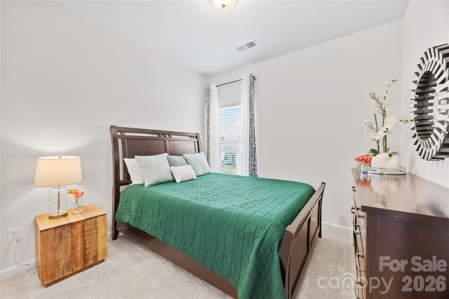 Furnished interior view inside a new home in Orchard Creek, Charlotte (Image 30).