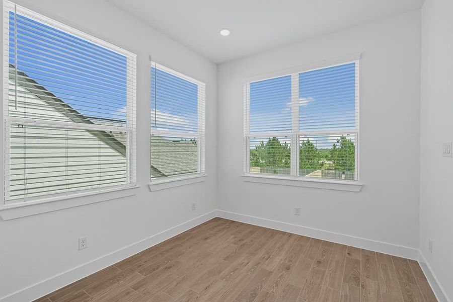 Spacious, unfurnished interior of a new home in Bridgeland Chateaus, Cypress (Image 14).