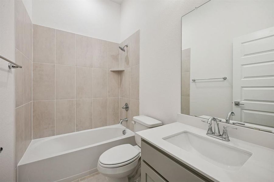 Bathroom in the Gilmour II home plan by Trophy Signature Homes – REPRESENTATIVE PHOTO