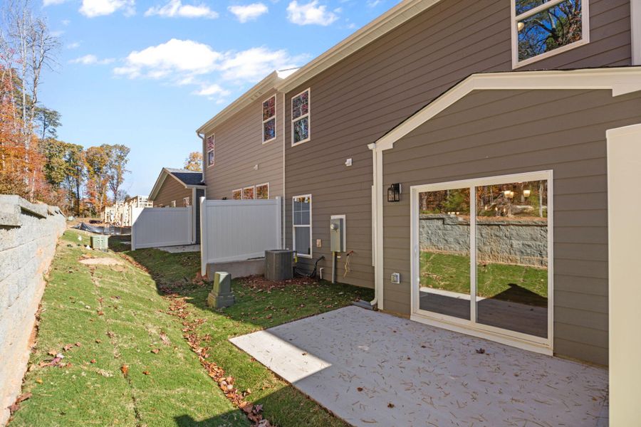 Exterior details and patio area of a home in Harbor Crossing, Greensboro (Image 23).
