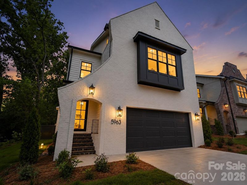 Front exterior of a new home in , Charlotte, NC, highlighting curb appeal (Image 2). Front exterior of a new home in , Charlotte, NC, highlighting curb appeal (Image 2).