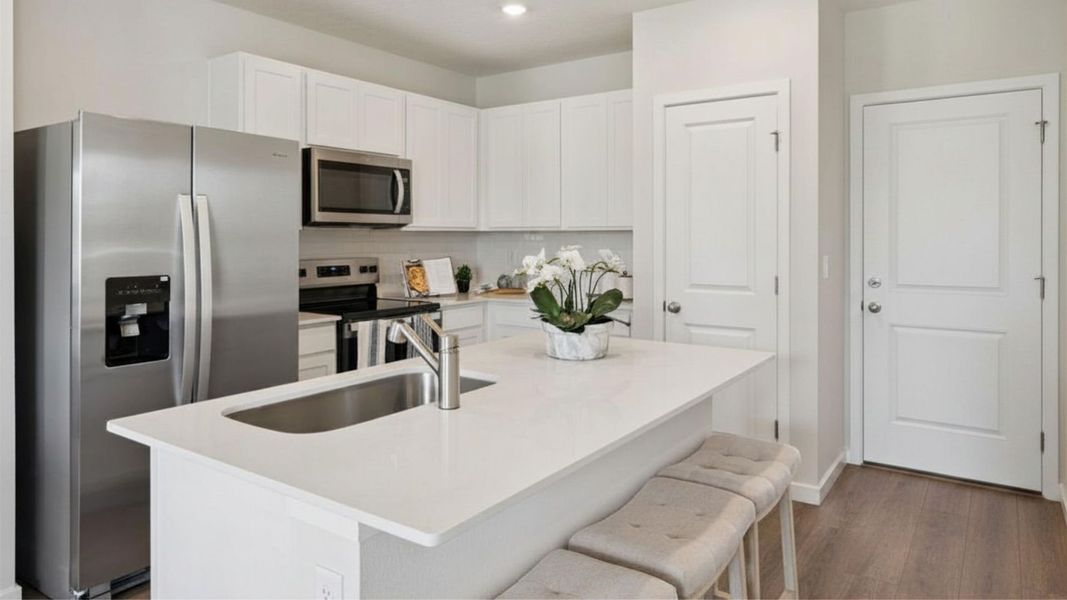 Representative furnished interior of a home built from the Sterling by D.R. Horton in Fish Lake Cove, Kissimmee (Image 7). Representative furnished interior of a home built from the Sterling by D.R. Horton in Fish Lake Cove, Kissimmee (Image 7).