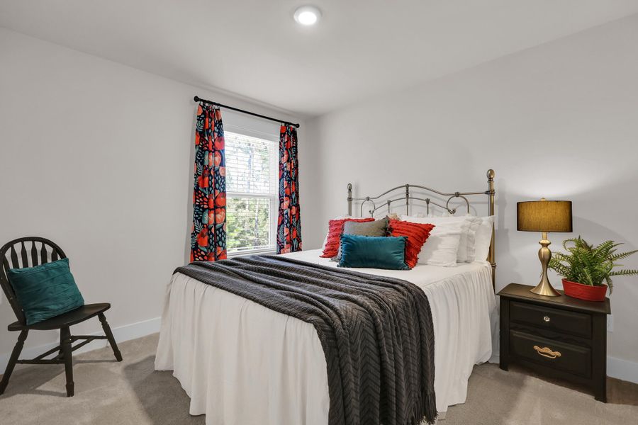 Furnished interior view inside a new home in Jasmine Point at Lakes of Cane Bay, Summerville (Image 30).