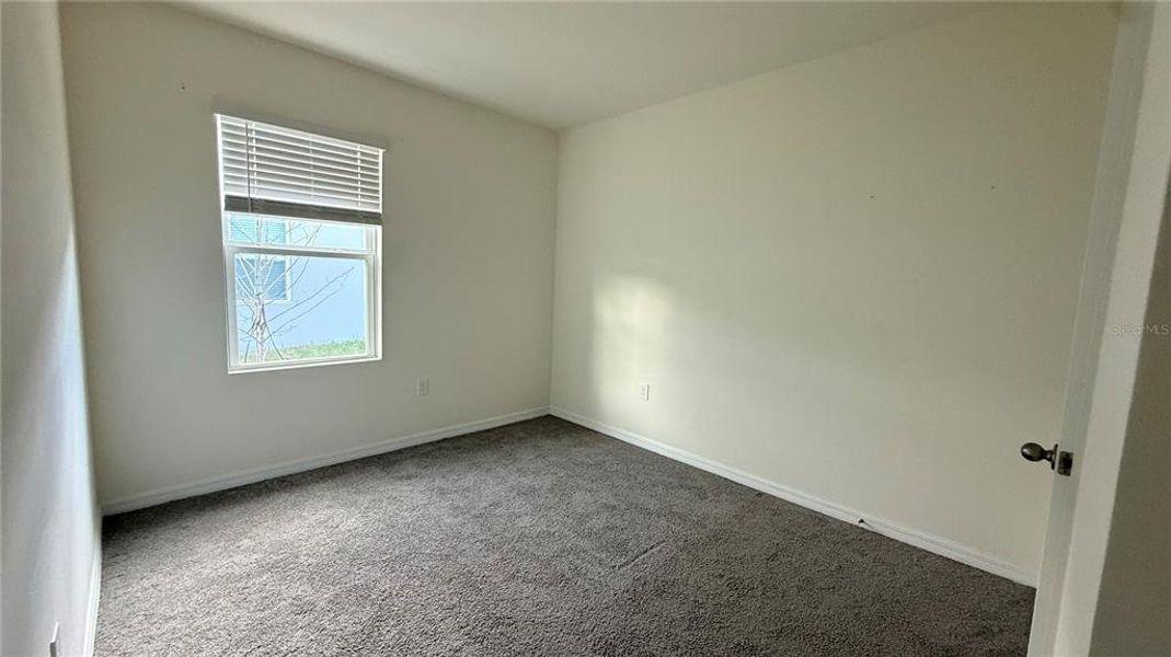 Spacious, unfurnished interior of a new home in Villamar by Express Homes, Winter Haven (Image 9).