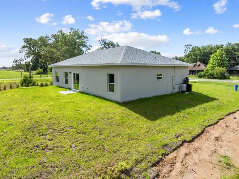 Exterior details and patio area of a home in , Yeehaw Junction (Image 3).