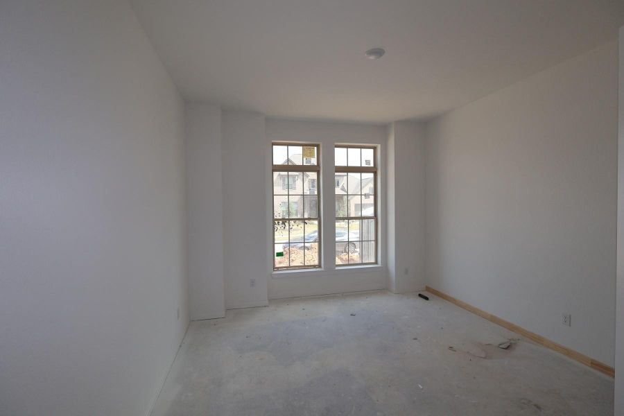 In-progress construction of a new home in Escondido 60' Homesites, Magnolia, TX (Image 3).