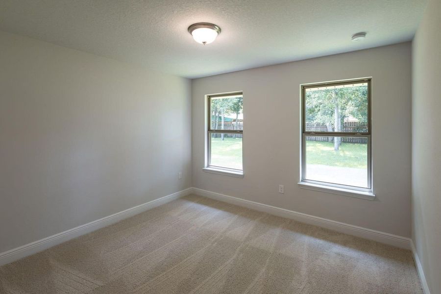 Representative unfurnished interior of a home built from the 2005 by Adams Homes in Parkland Place, Pace (Image 20).