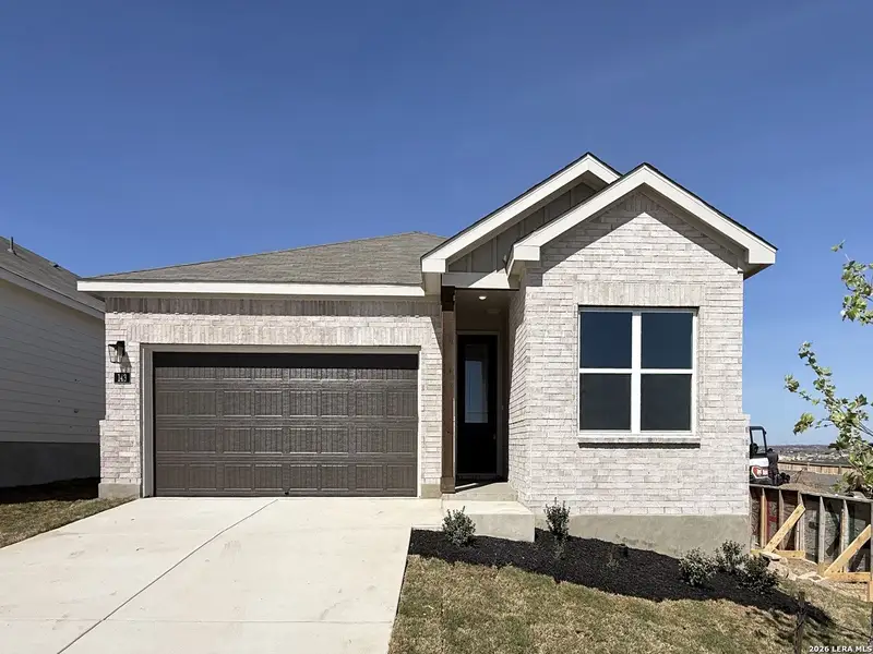 Front exterior of a new home in The Wilder, Adkins, TX, highlighting curb appeal (Image 1). Front exterior of a new home in The Wilder, Adkins, TX, highlighting curb appeal (Image 1).