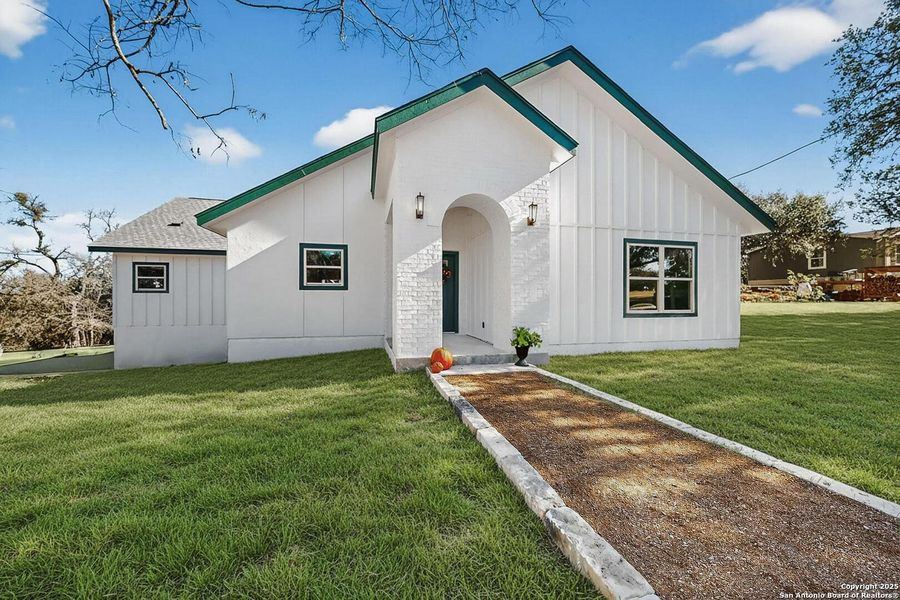Exterior details and patio area of a home in , Spring Branch (Image 26).