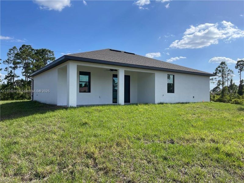 Exterior details and patio area of a home in , Lehigh Acres (Image 3).