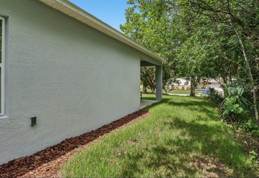 Exterior details and patio area of a home in Coastal Communities, Ormond Beach (Image 4). Exterior details and patio area of a home in Coastal Communities, Ormond Beach (Image 4).