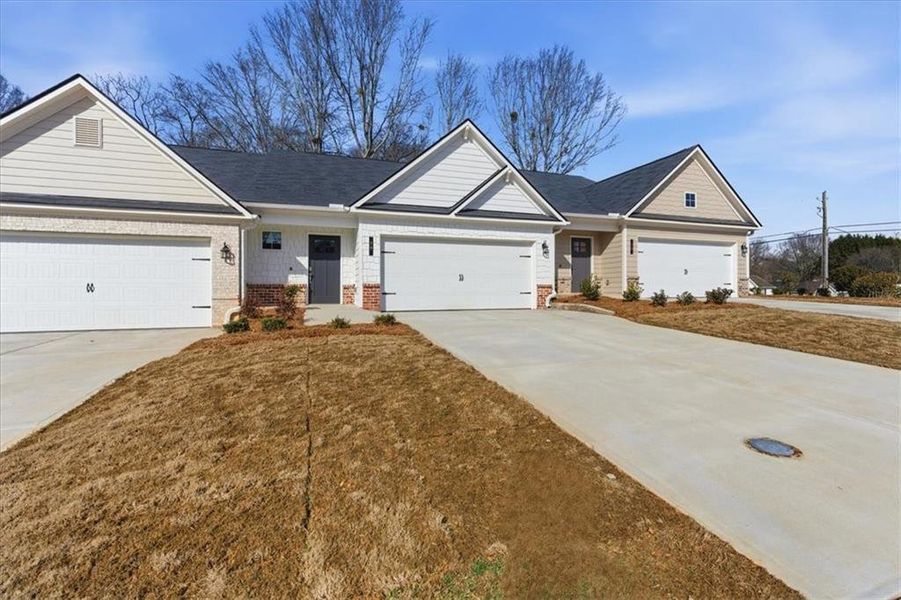 Front exterior of a new home in Silver Leaf, Dawsonville, GA, highlighting curb appeal (Image 22).