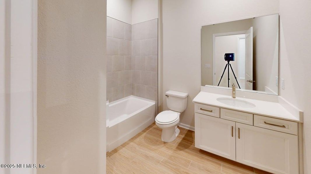 Furnished interior view inside a new home in RiverTown - WaterSong, St. Johns (Image 9).