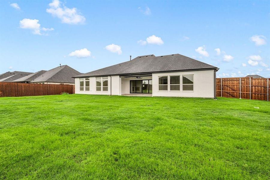 Exterior details and patio area of a home in NorthGlen, Haslet (Image 28).