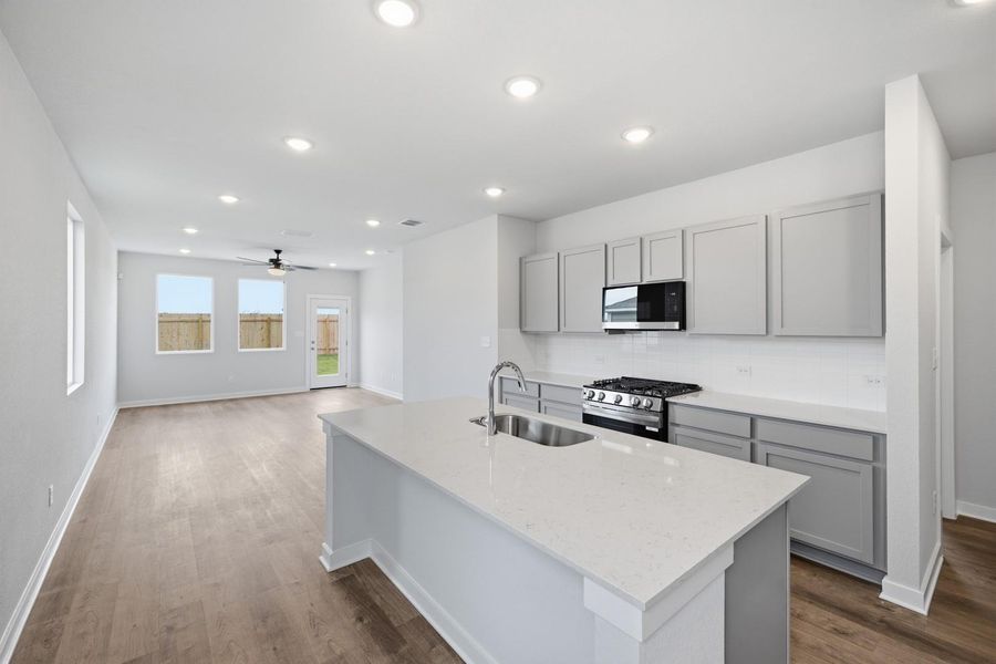 Furnished interior view inside a new home in Stallion Run, Buda (Image 5).