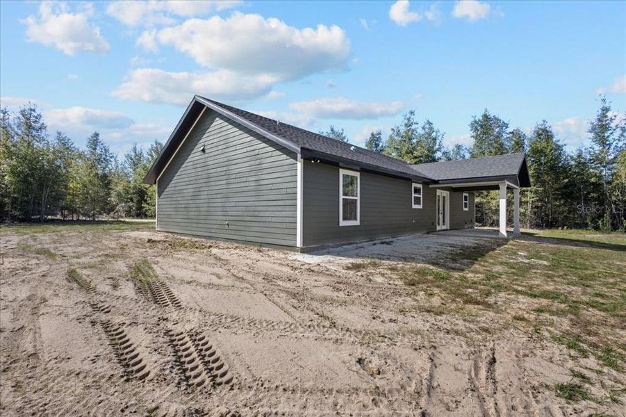 Exterior details and patio area of a home in , Bell (Image 20).