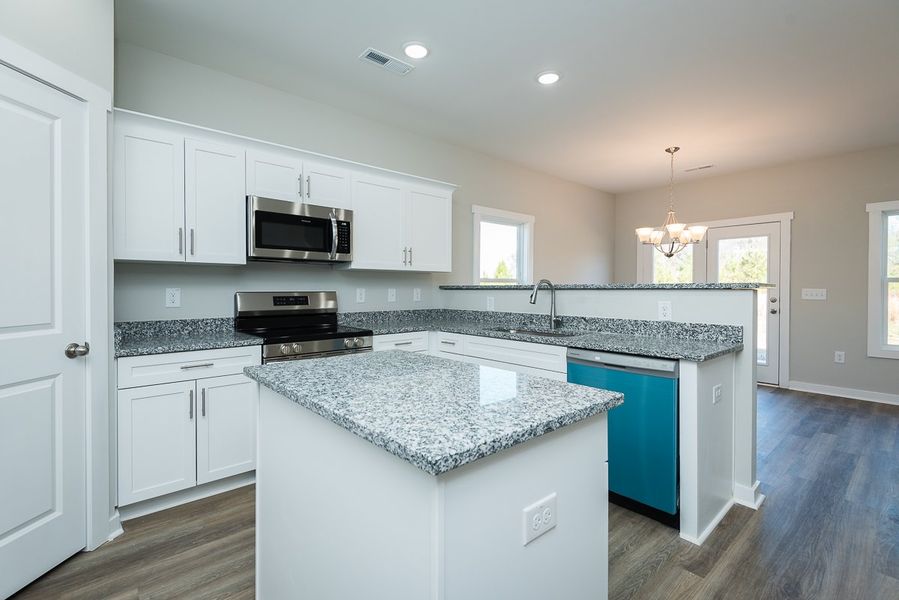 Representative furnished interior of a home built from the Brook C by Foundation Home Builders LLC in Pallini Place, Ossipee (Image 6).
