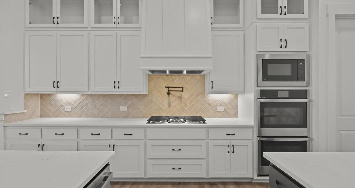 Representative furnished interior of a home built from the Allison by Chesmar Homes in Sweetwater, Austin (Image 6).