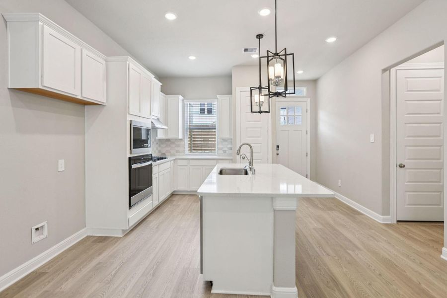 Furnished interior view inside a new home in Kemah Crossing - Luxe Series, Kemah (Image 15). Furnished interior view inside a new home in Kemah Crossing - Luxe Series, Kemah (Image 15).