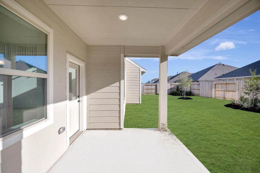 Relax outdoors on the covered patio Relax outdoors on the covered patio
