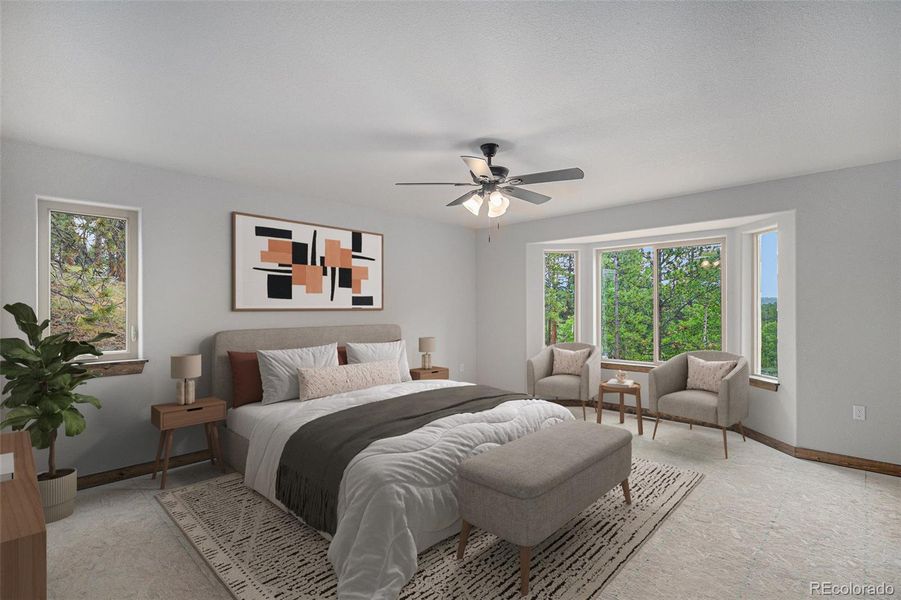 Primary bedroom with bay windows and beautiful view- Virtually staged