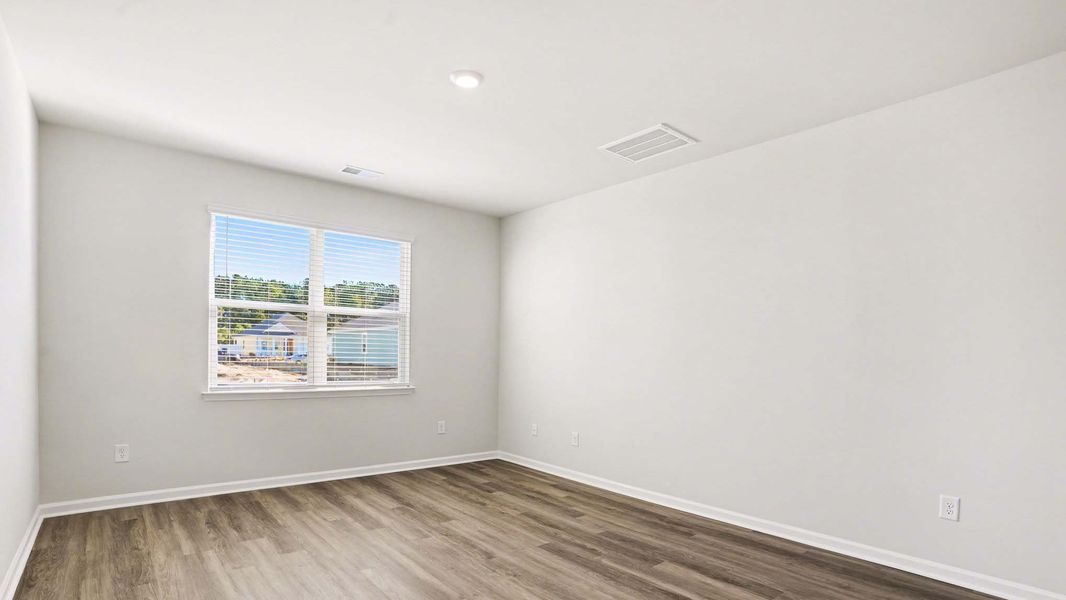 Representative unfurnished interior of a home built from the Alston by D.R. Horton in Preserve at Cypress Commons, Conway (Image 10).