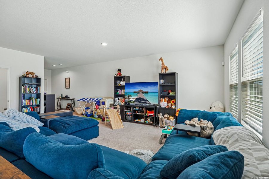 Furnished interior view inside a new home in Hennersby Hollow, San Antonio (Image 31).