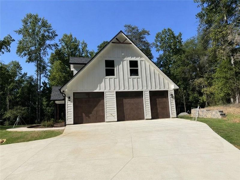 Front exterior of a new home in , Gainesville, GA, highlighting curb appeal (Image 20). Front exterior of a new home in , Gainesville, GA, highlighting curb appeal (Image 20).