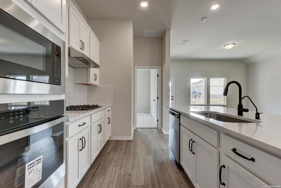 Furnished interior view inside a new home in Arcadia Ridge, San Antonio (Image 3).