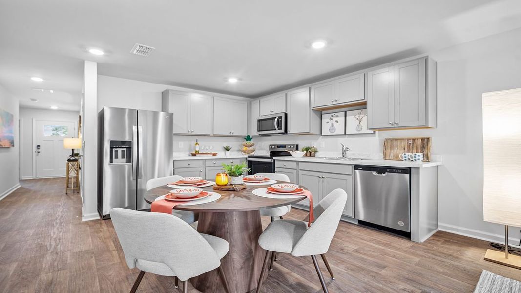 Representative furnished interior of a home built from the Sullivan by D.R. Horton in Rice Hope, Port Wentworth (Image 4).