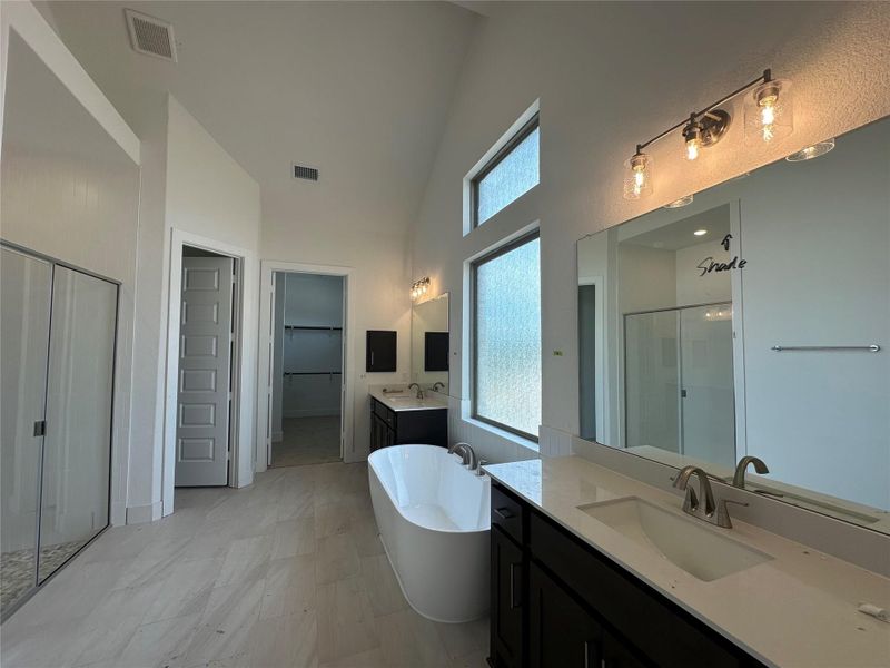 Primary Bath retreat with dual vanities & soaking tub
