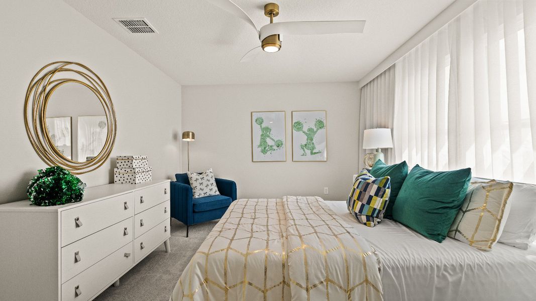 Secondary Bedroom in the Model Highbourne by DRB Homes in Hamilton Bluff located in Haines City, FL. Secondary Bedroom in the Model Highbourne by DRB Homes in Hamilton Bluff located in Haines City, FL.