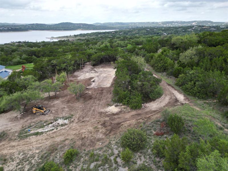 A spacious lot with partial clearing, ready for a dream build amidst scenic natural beauty.