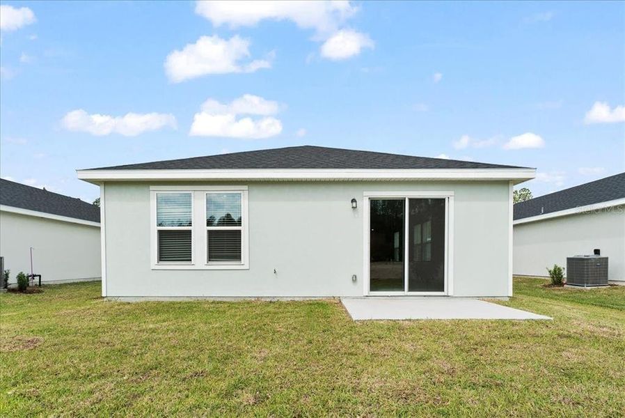 Exterior details and patio area of a home in Flagler Village - Classic Series, Palm Coast (Image 4). Exterior details and patio area of a home in Flagler Village - Classic Series, Palm Coast (Image 4).