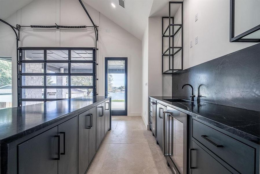 With Roll up door to outdoor kitchen