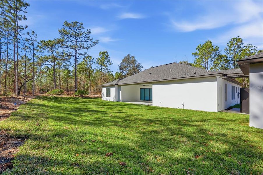 Exterior details and patio area of a home in , Wildwood (Image 4).