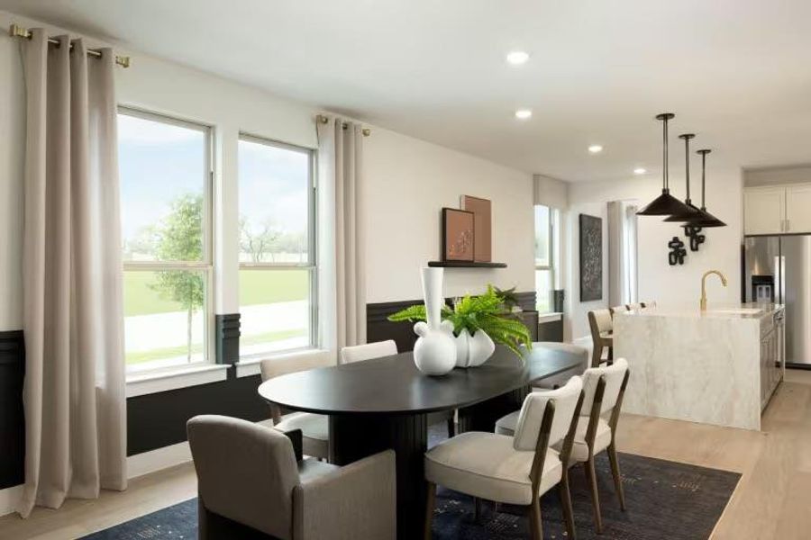 Photo of Pulte model home with same floor plan, not of actual home listed.