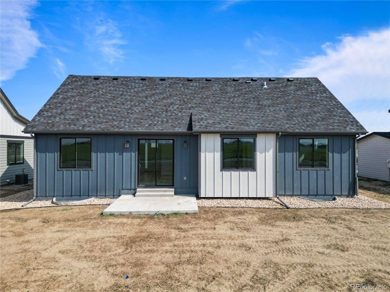 Front exterior of a new home in , Fort Morgan, CO, highlighting curb appeal (Image 23).