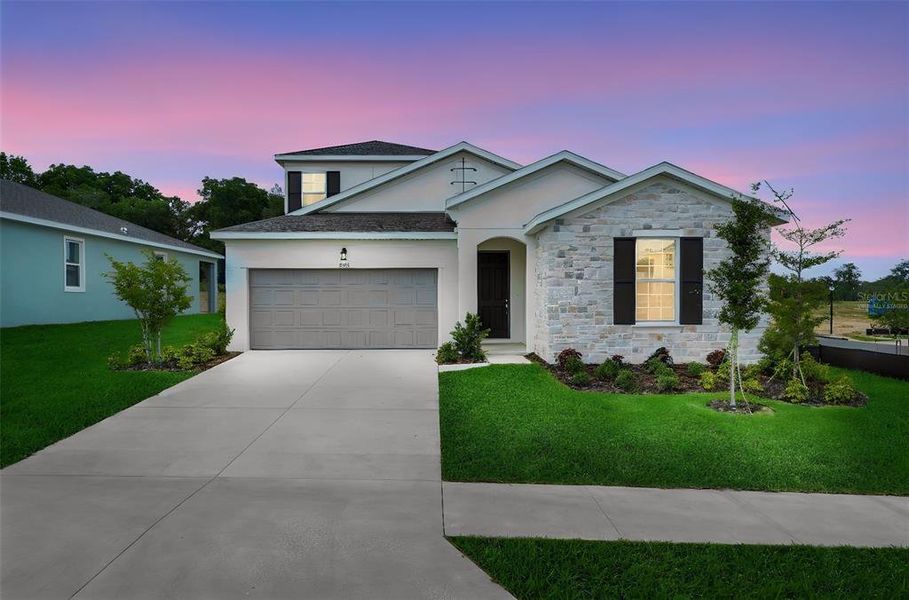 Front exterior of a new home in Tuscan Hills, Dade City, FL, highlighting curb appeal (Image 2). Front exterior of a new home in Tuscan Hills, Dade City, FL, highlighting curb appeal (Image 2).