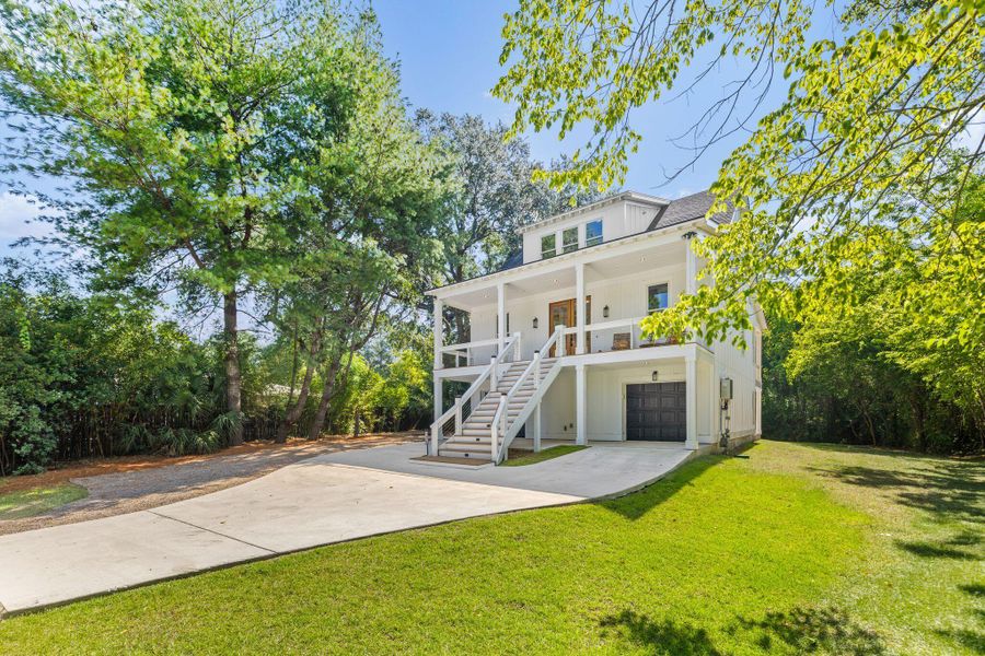 Front exterior of a new home in , Charleston, SC, highlighting curb appeal (Image 2). Front exterior of a new home in , Charleston, SC, highlighting curb appeal (Image 2).
