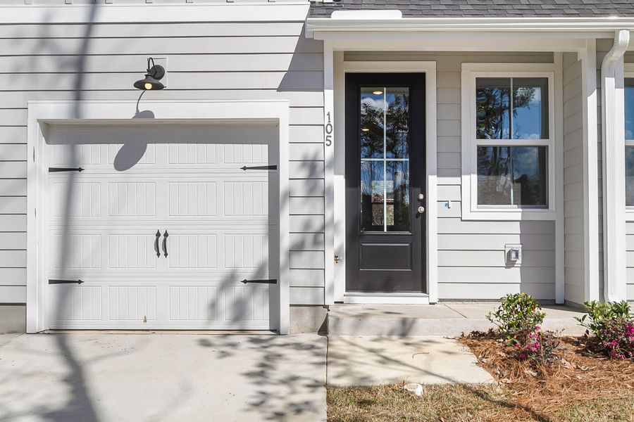Exterior details and patio area of a home in Windward Village, Summerville (Image 3). Exterior details and patio area of a home in Windward Village, Summerville (Image 3).